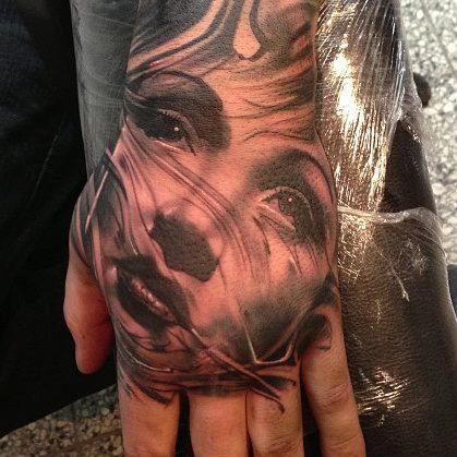 Realistic Woman Hand Tattoo