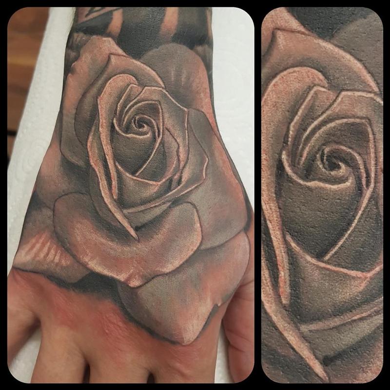 Rose on a hand