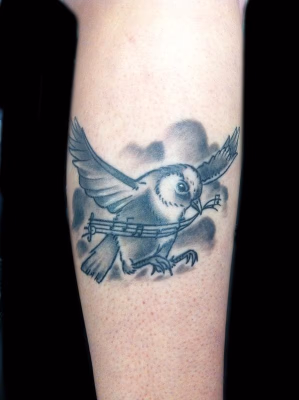 She wanted a image on google that alot of people already have tattooed. So i came up with this orginial drawing and she liked it.