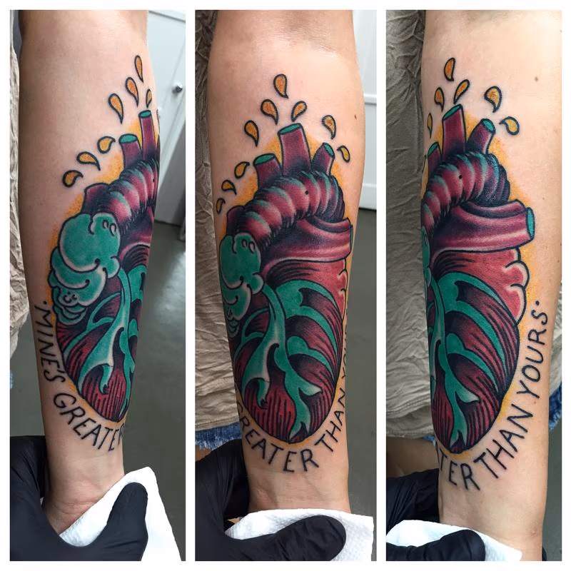 "Greater Than Yours" Heart Forearm Tattoo