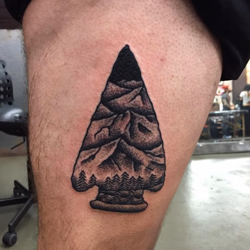 Blackwork Woodcarving Arrowhead Calf Tattoo