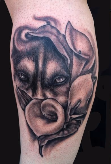 Wolf eyes and Cala Lily tattoo