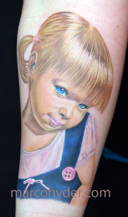 Portrait of little girl in blue dress