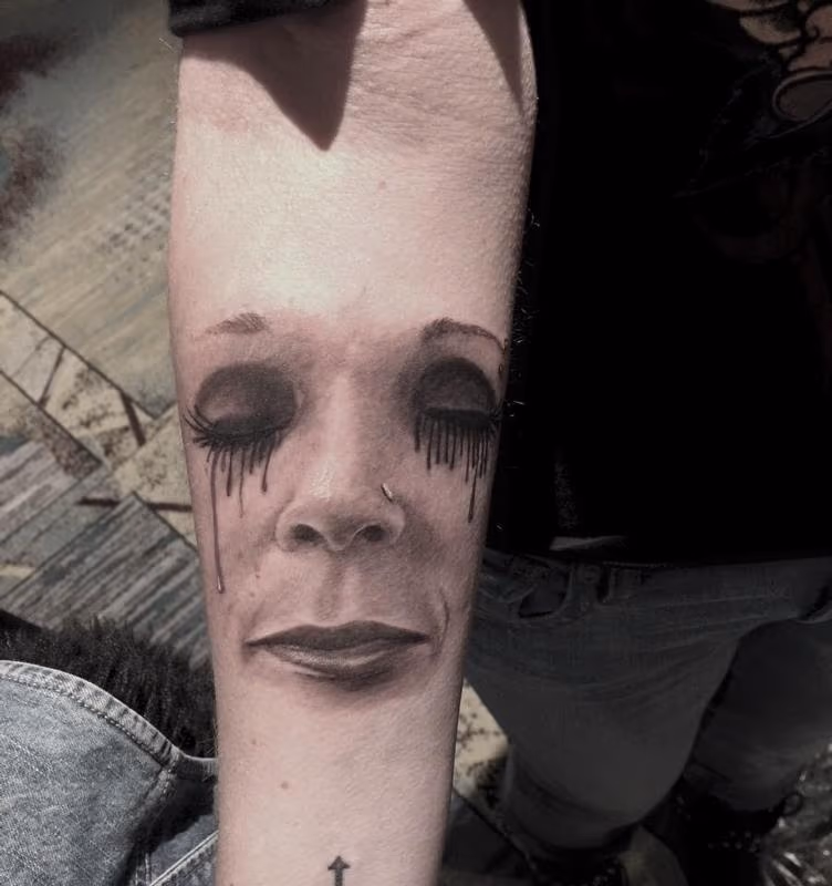 Black and Gray Womens Face