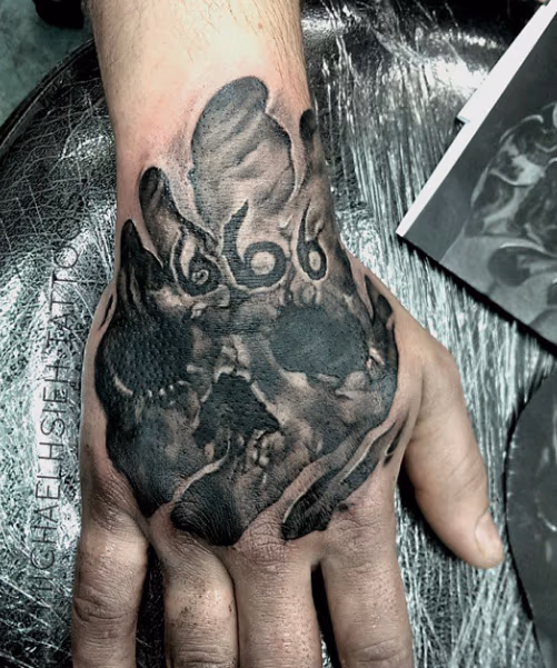 Skull Hand Tattoo