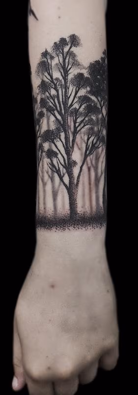 dotwork black forest canopy forearm tattoo
