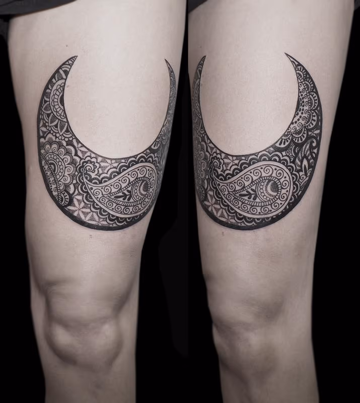 dotwork linework traditional indian style paisley moon tattoo