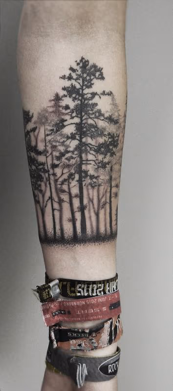 dotwork black forest canopy forearm tattoo