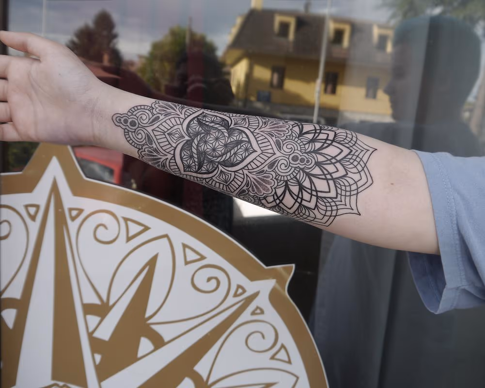 dotwork linework mandala tattoo