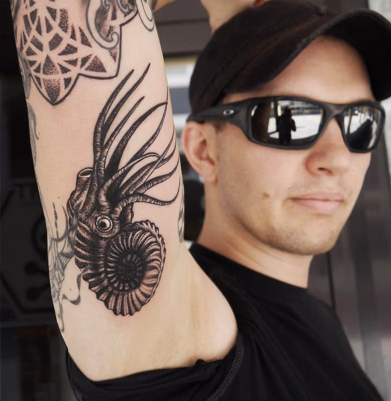 dotwork realistic Nautilus sea creature tattoo