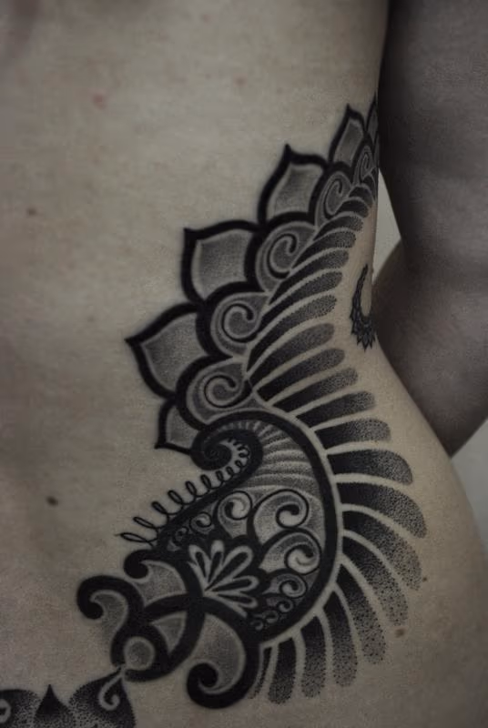 bongo style ornamental paisley dotwork linework tattoo