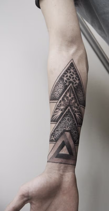 dotwork geometric forearm tattoo