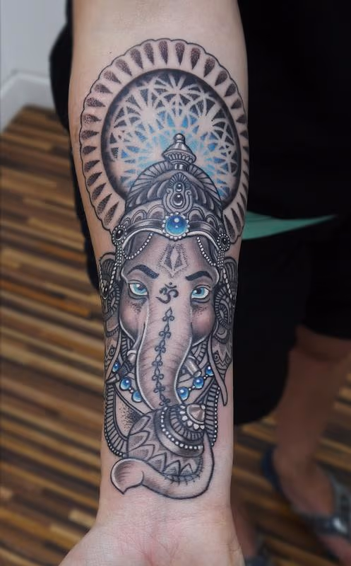 dotwork ganesh mandala tattoo