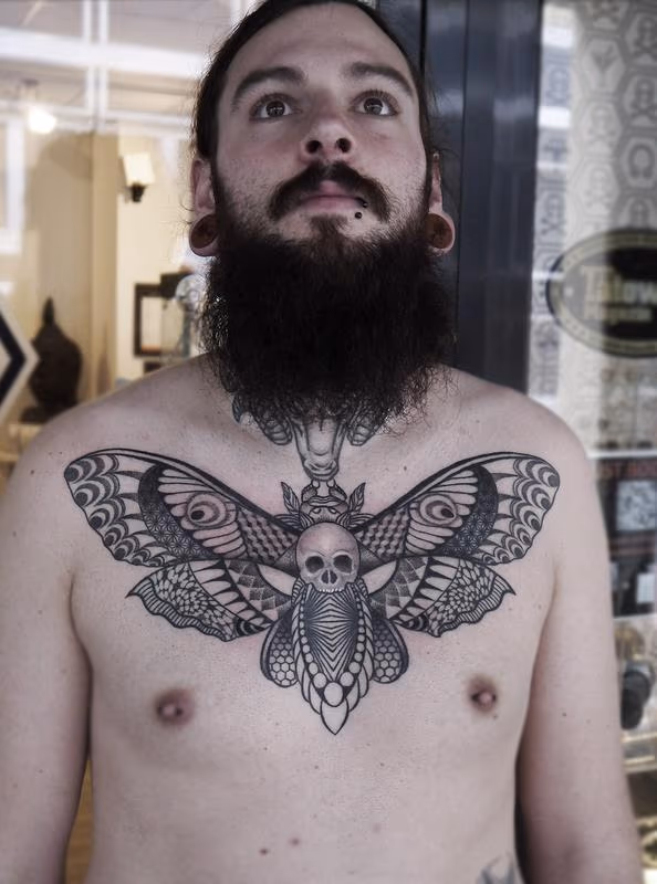dotwork linework geometric death head moth tattoo