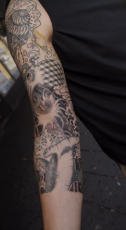 dotwork underwater ocean themed geometrical theree quarter sleeve in progress