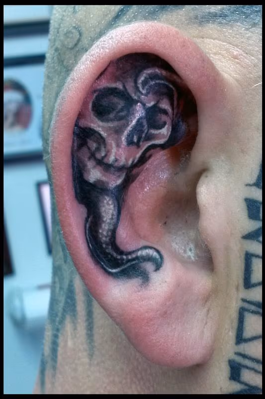 Craigs Skull and Tentacle Ear Tattoo