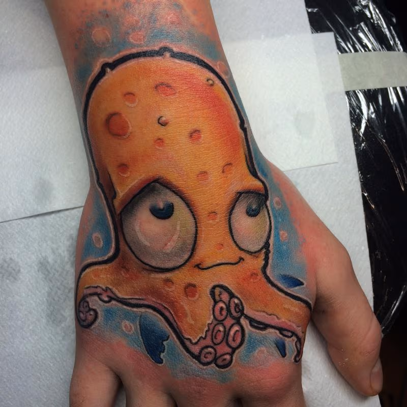 hand squid tattoo