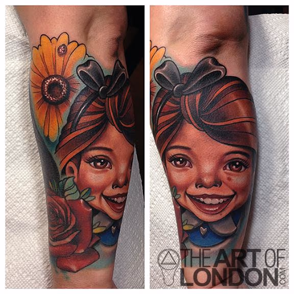 Cartoon Girl and Daisy Tattoo
