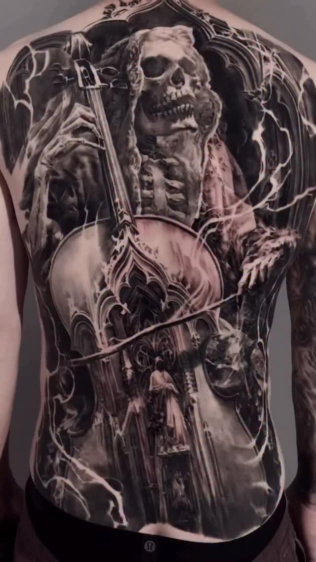 Grim reaper back-piece with skull and scythe
