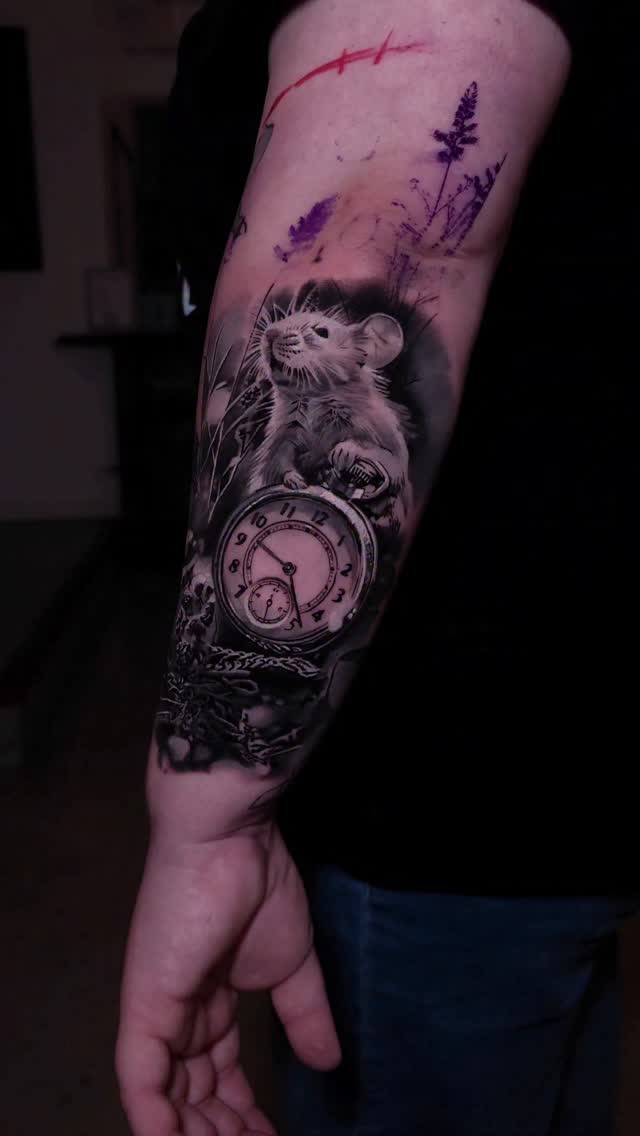 Mouse with pocket watch and wildflowers leg tattoo
