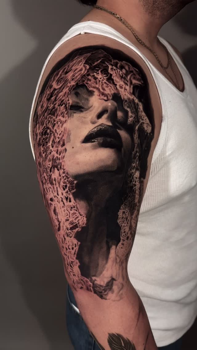 Woman portrait with textured veil, shoulder tattoo