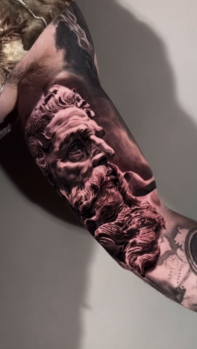 Poseidon portrait tattoo, forearm