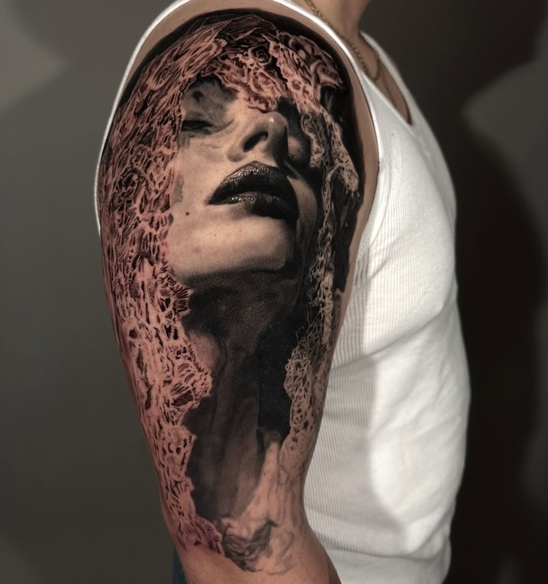Portrait woman with lace detail, shoulder tattoo