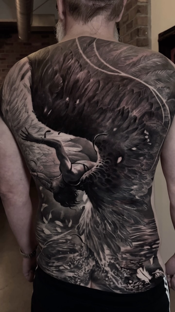 Icarus mythology back-piece in black and grey
