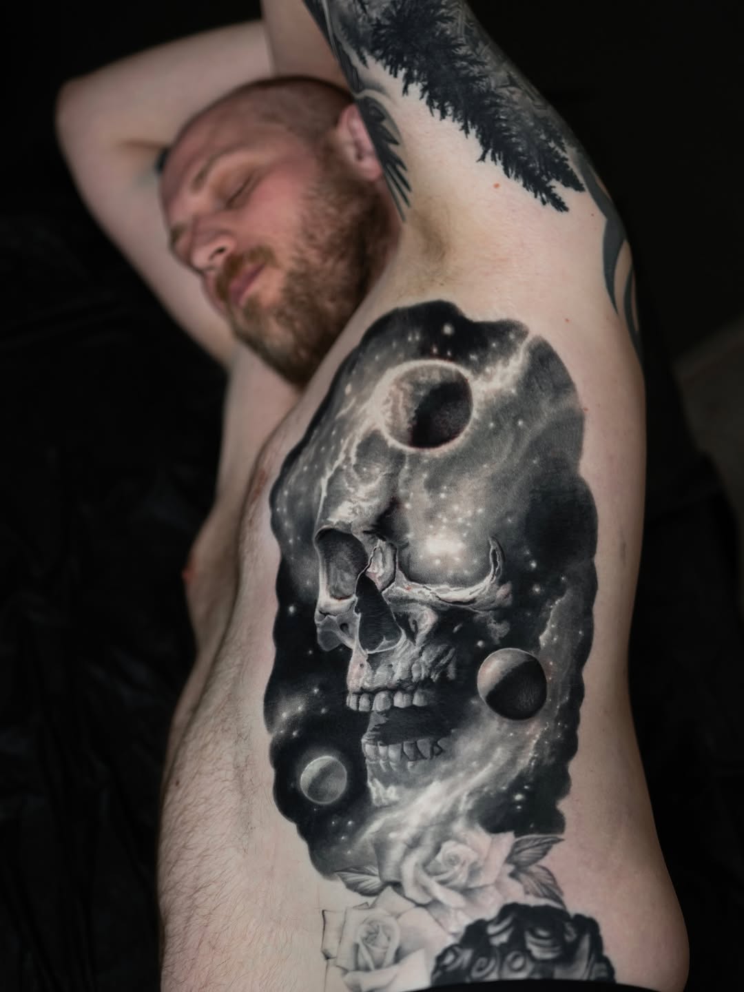Cosmic skull with roses and celestial space, ribs