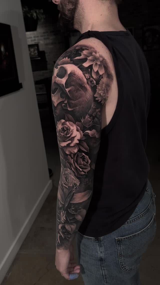 Skull and roses full sleeve in black-and-grey