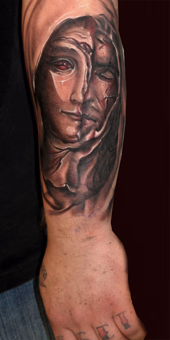 Black and grey half jesus half mary.