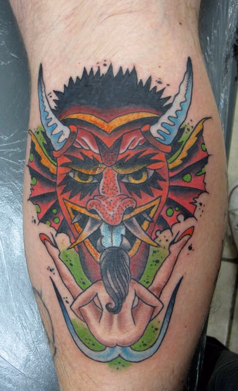 traditional demon with a girl tattoo