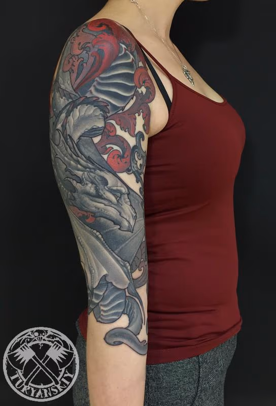 Dragon and a key tattoo
