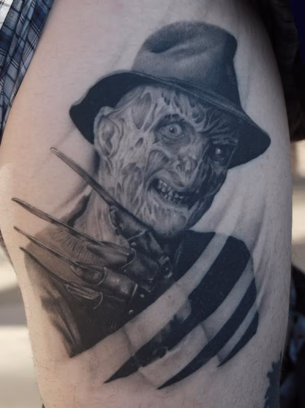 Black and Gray Freddy Portrait Tattoo