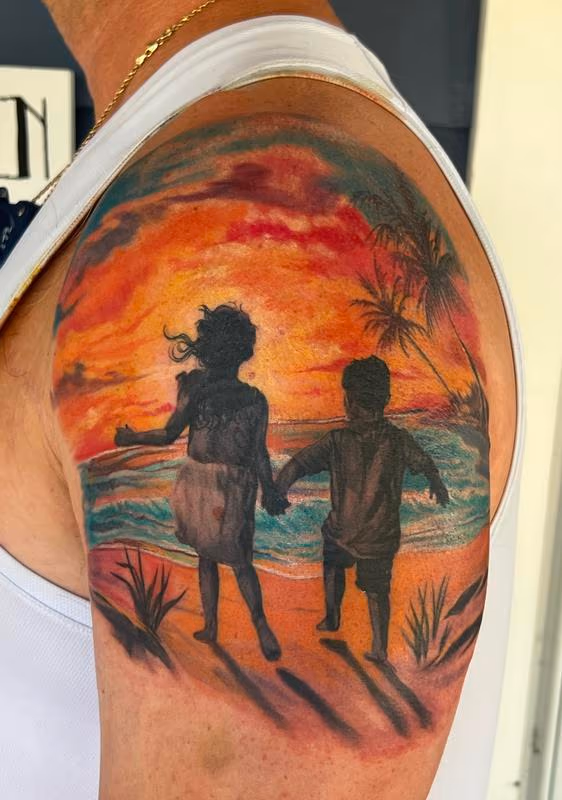 Children at the beach tattoo