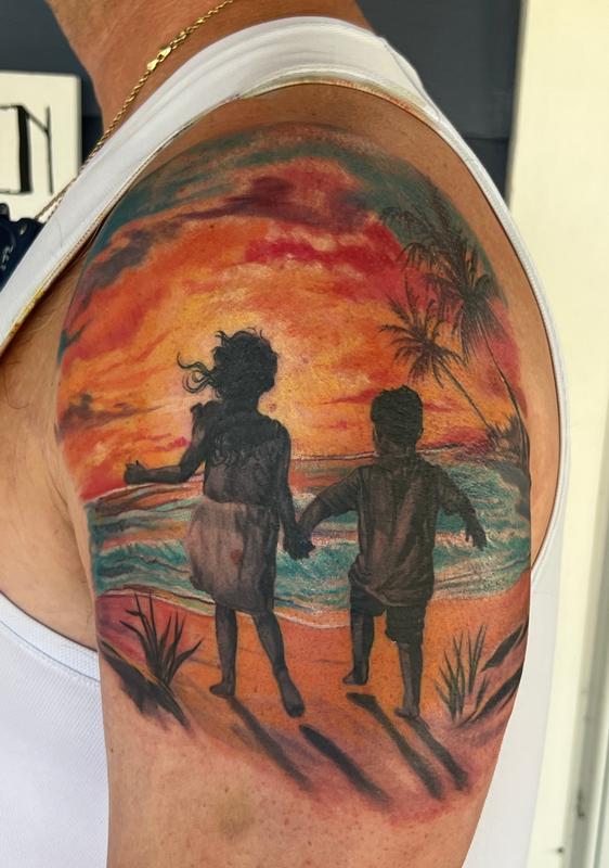 Children at the beach tattoo