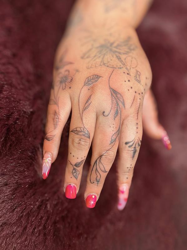 Ornamental Hand Tattoo