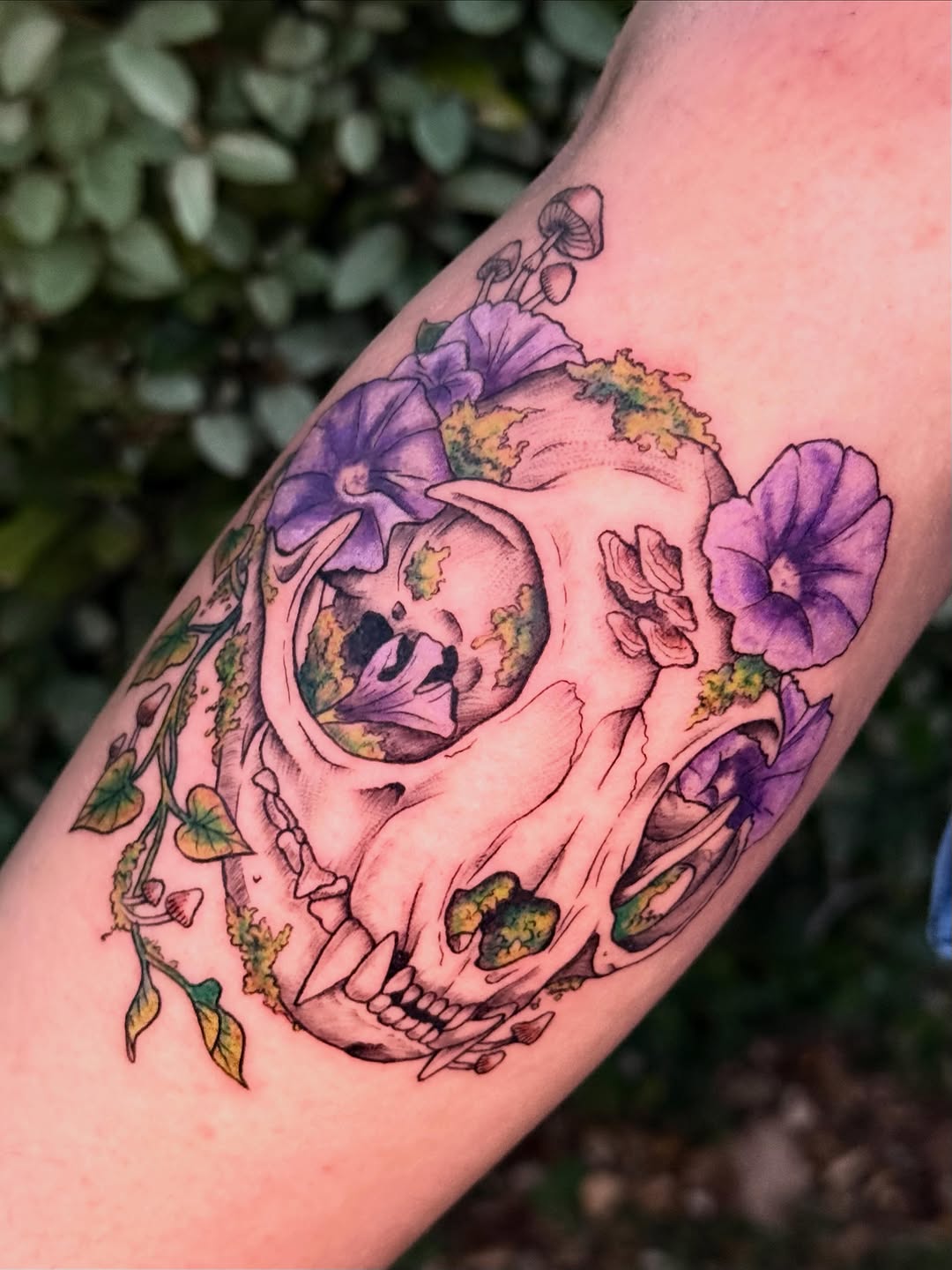 Skull with flowers and botanical decay, forearm