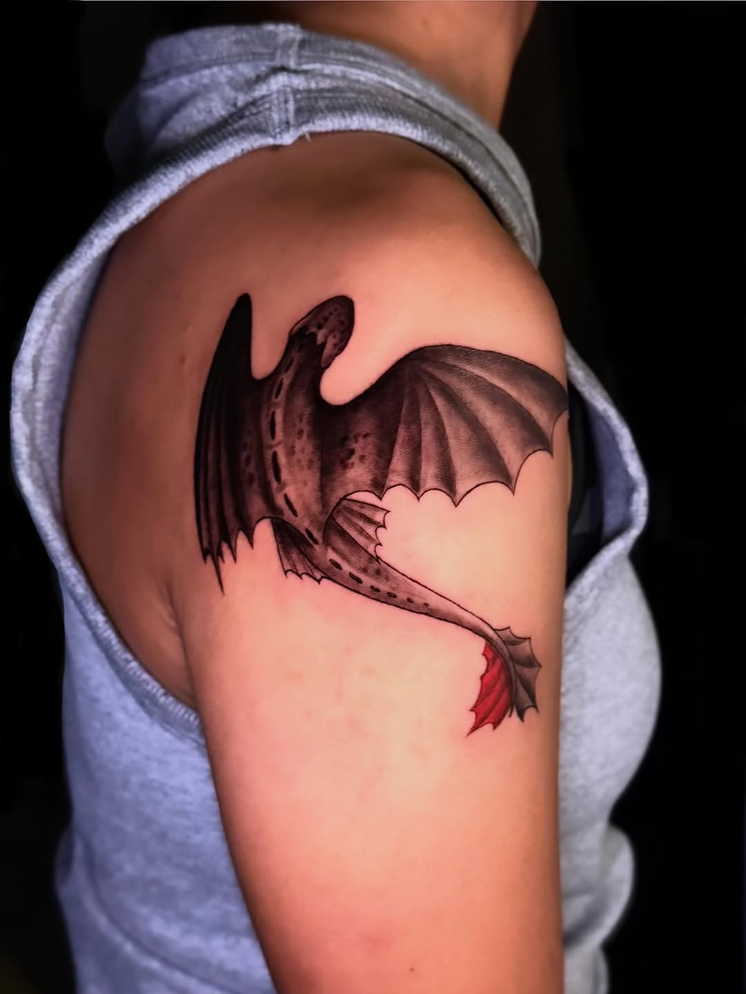 Toothless dragon color tattoo, shoulder