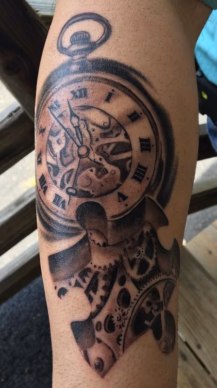 Pocket watch puzzle tattoo
