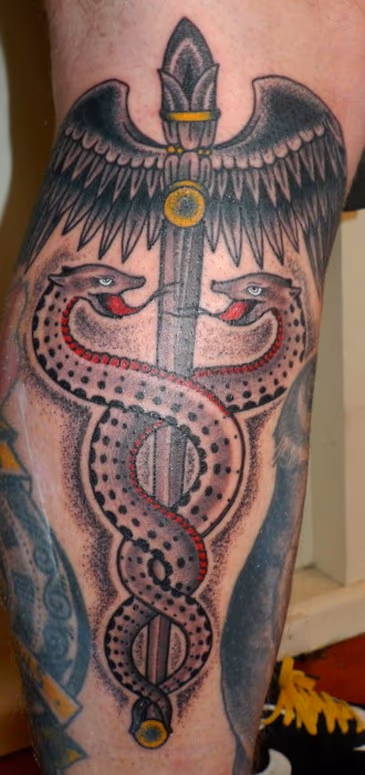 Custom color serpent tattoo