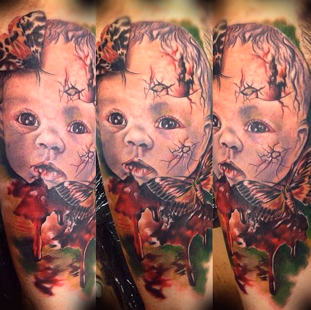 Creepy Dolls face with moths