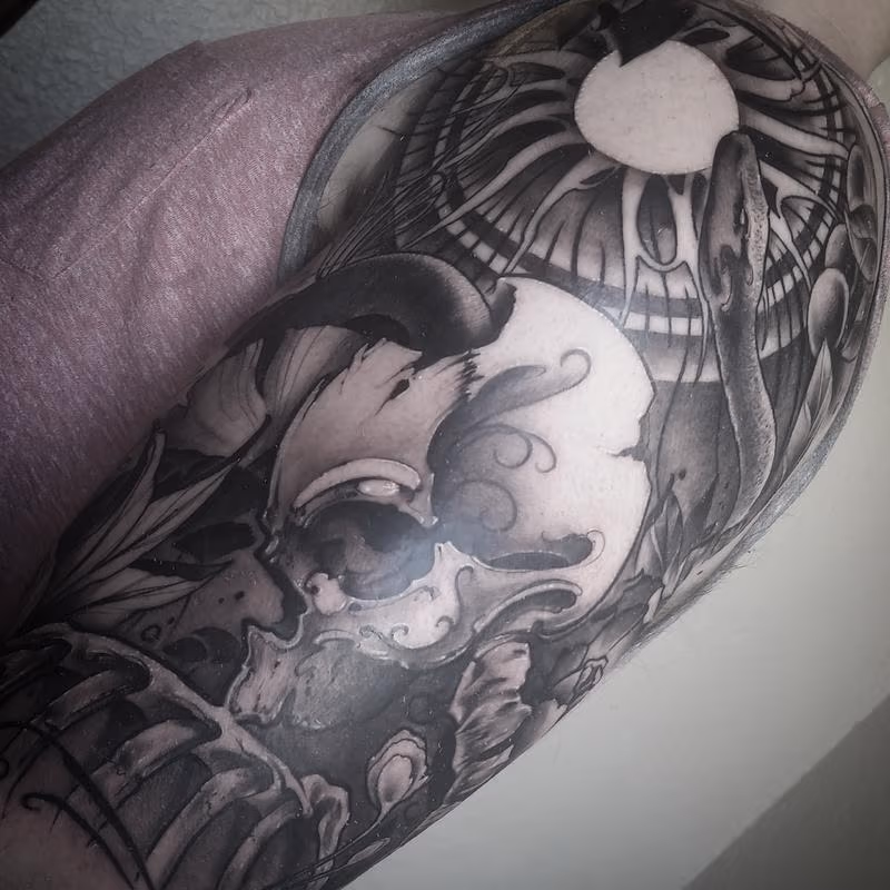 Black and Grey sun Skull Snake Art Nouveau Neotrad Yorick Tattoo